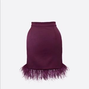 Blaire mini feather skirt in plum. Threads on zip showing see pics.